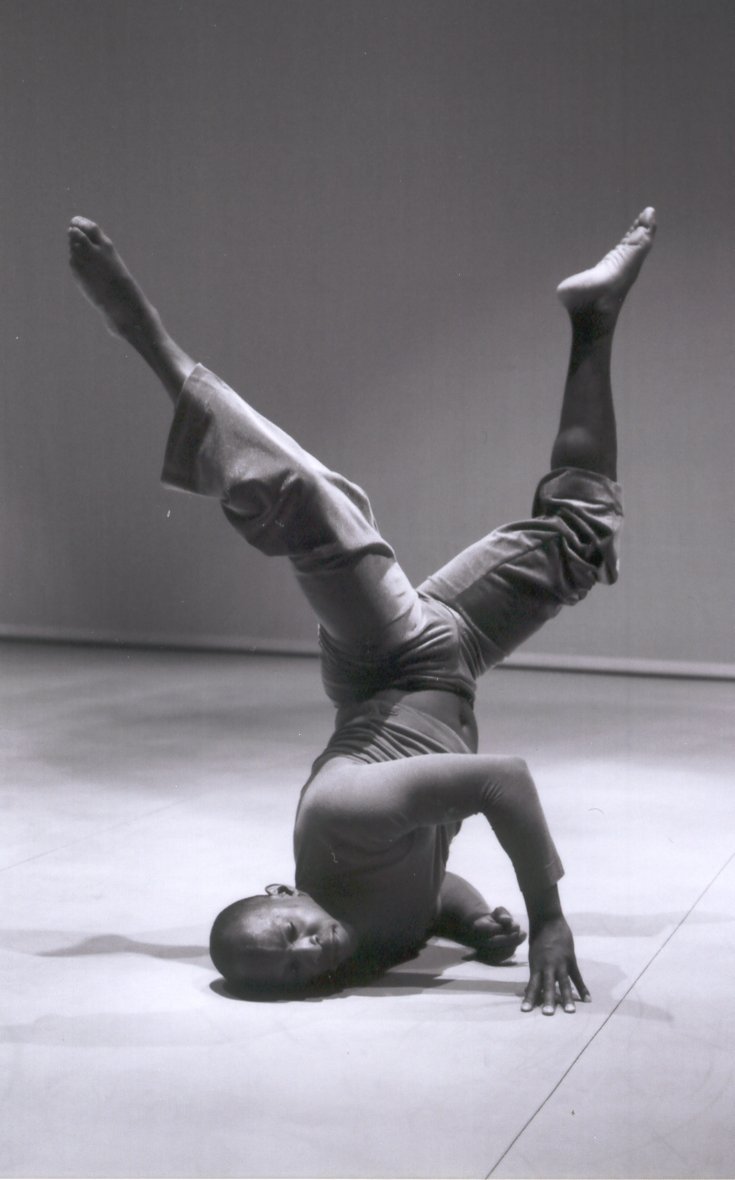 Boris Willis low to the ground in a gestural pose