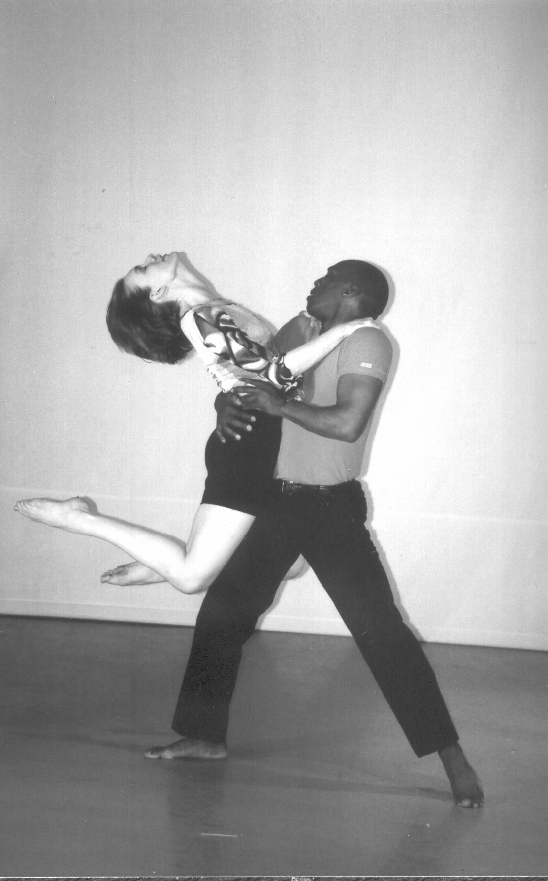 Boris Willis and Emily Berry in a partnered dip, her back arched, in Aliens