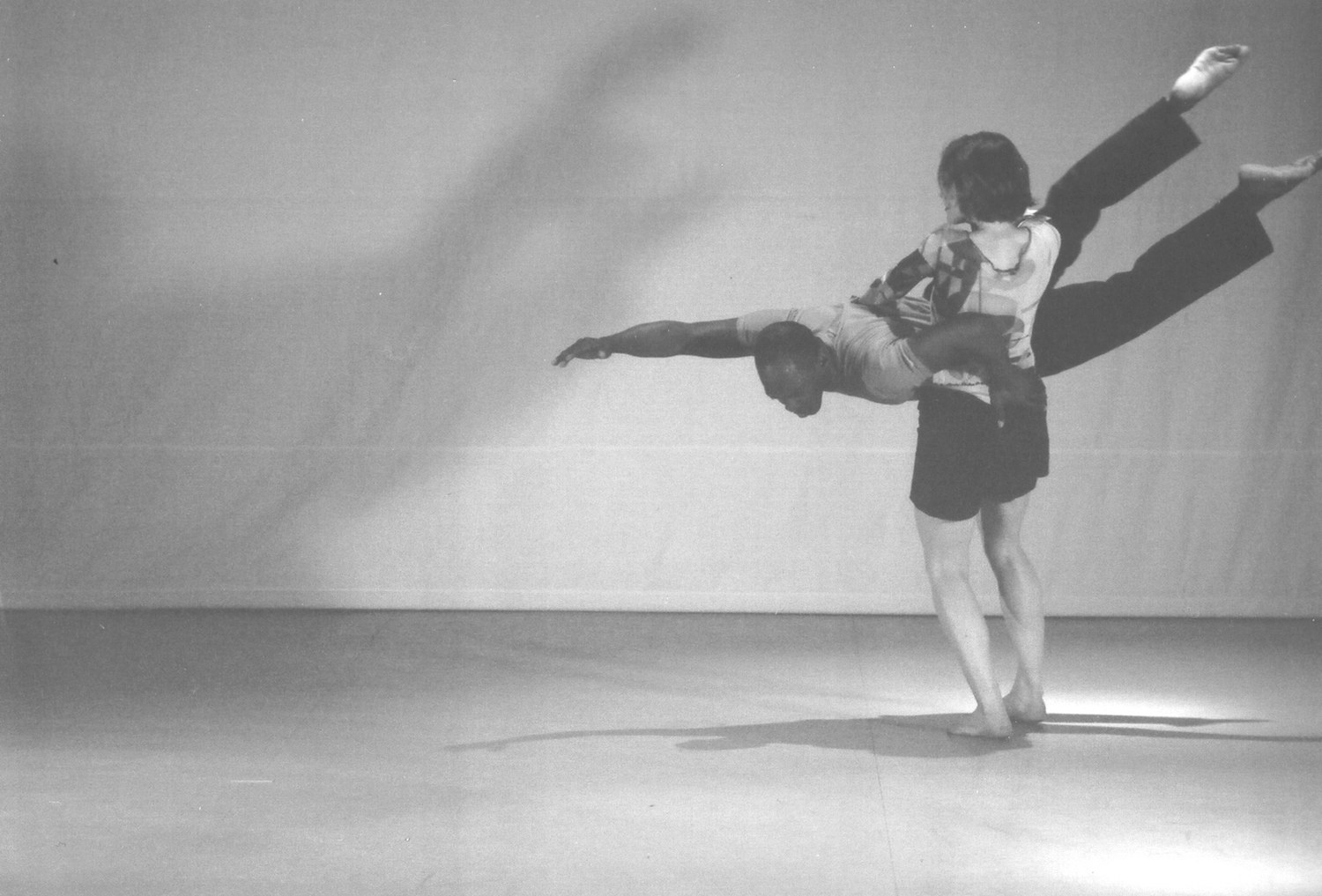 Boris Willis balanced horizontally across Emily Berry in a counterweight in Aliens
