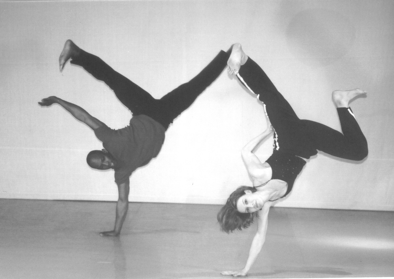 Boris Willis and a dancer in a mirrored inverted balance